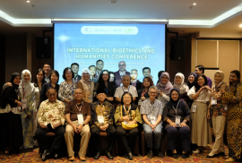 A group photo with participants at the pre-conference workshop